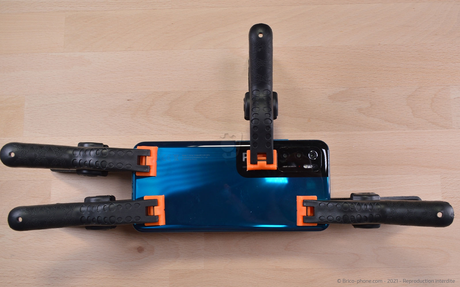 Changement de la vitre arrière sur Poco M3 Pro photo 3