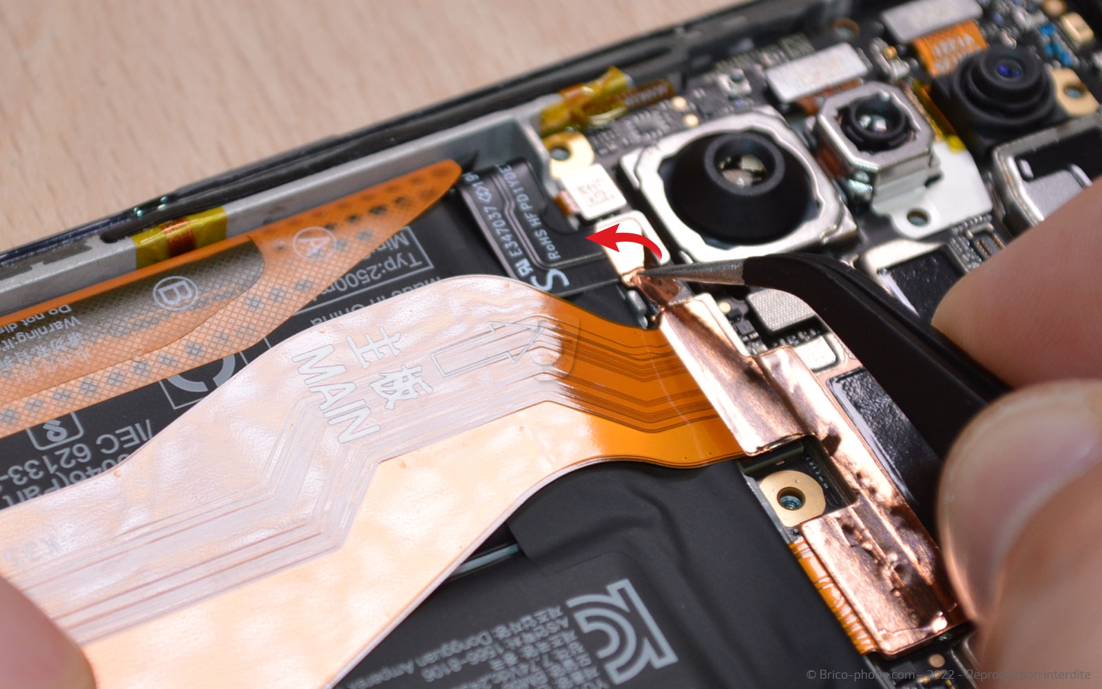 Comment changer la batterie sur 11T PRO photo 2