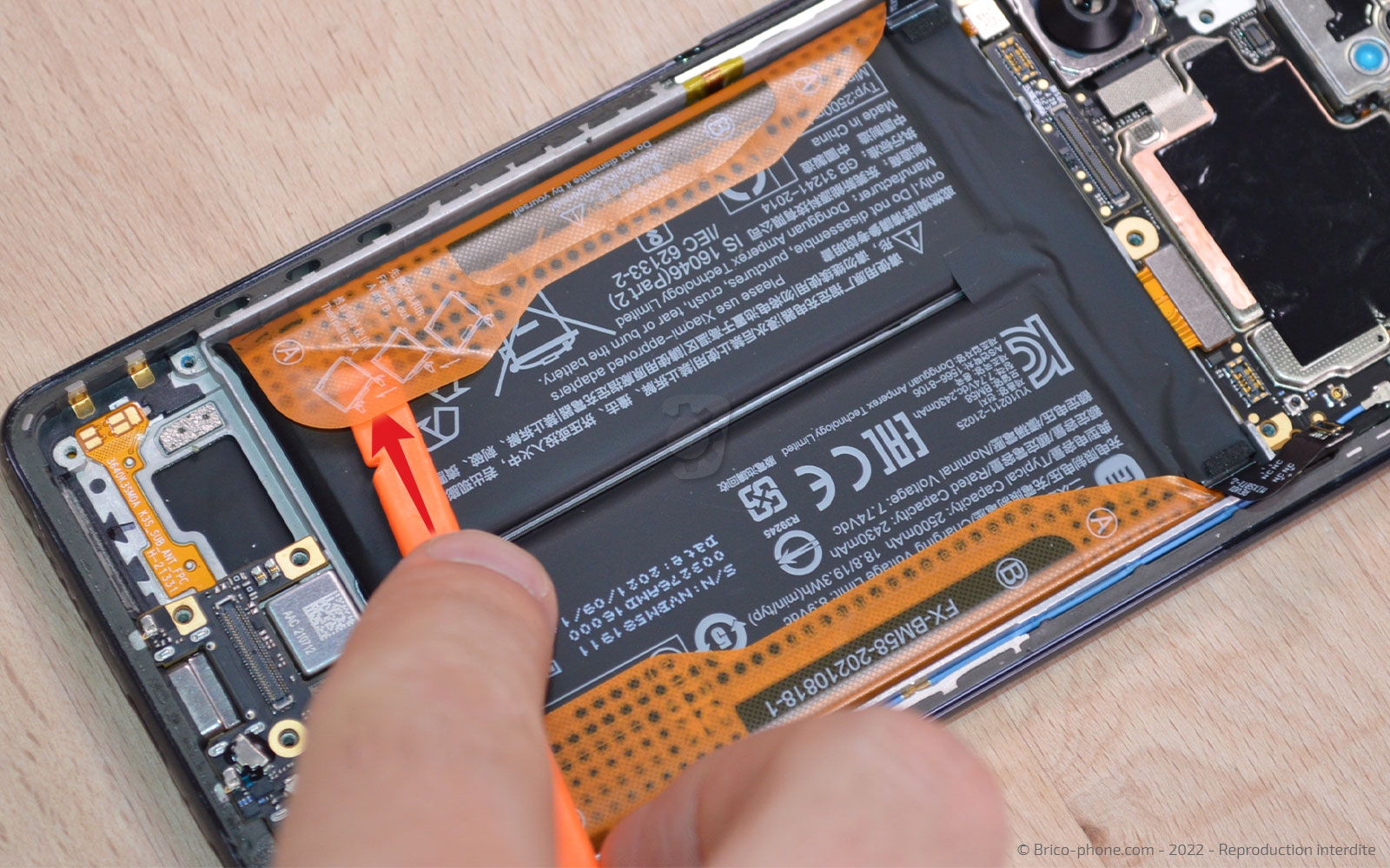 Comment changer la batterie sur 11T PRO photo 1