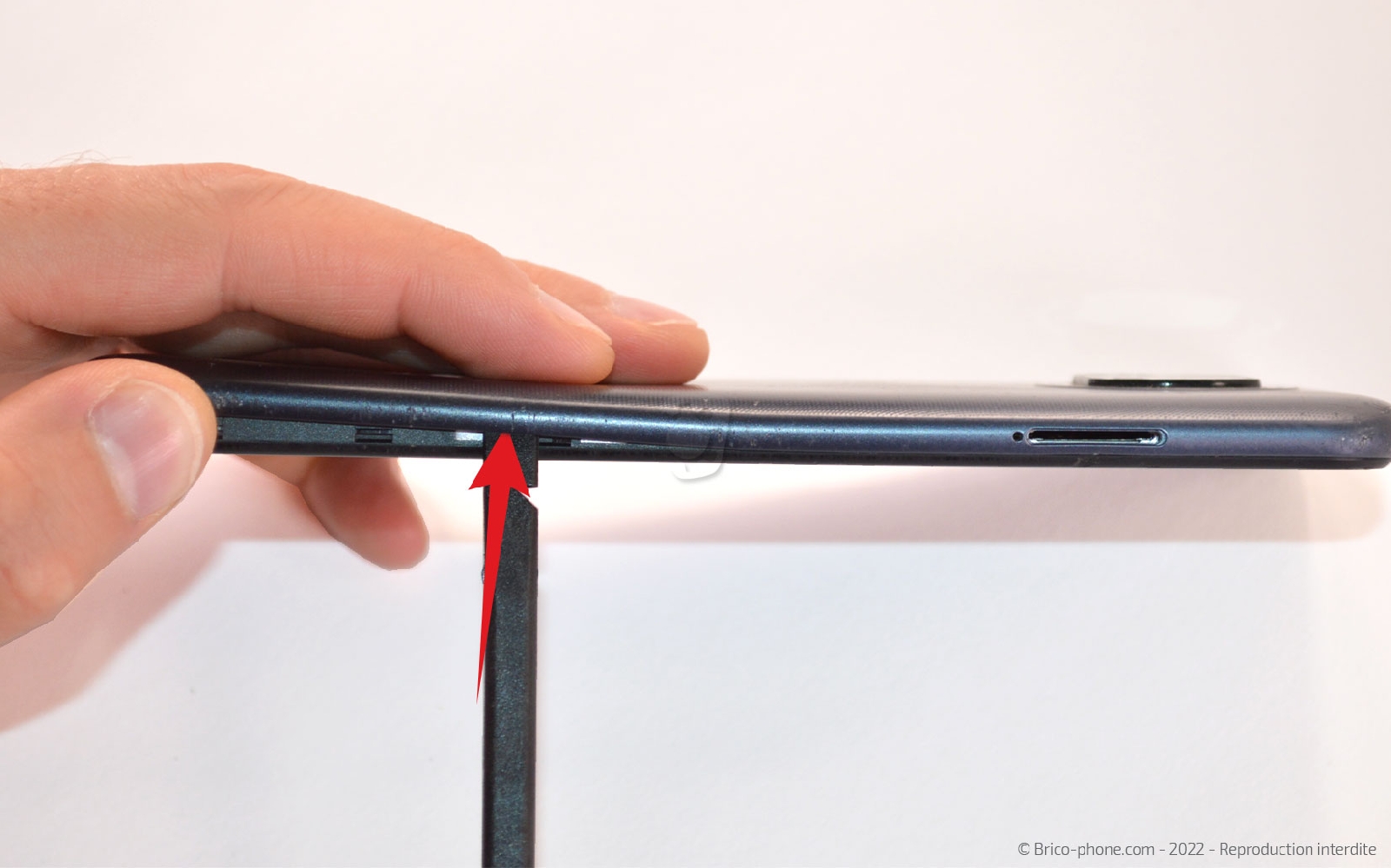 Comment changer la coque arrière  sur Redmi note 9T photo 2