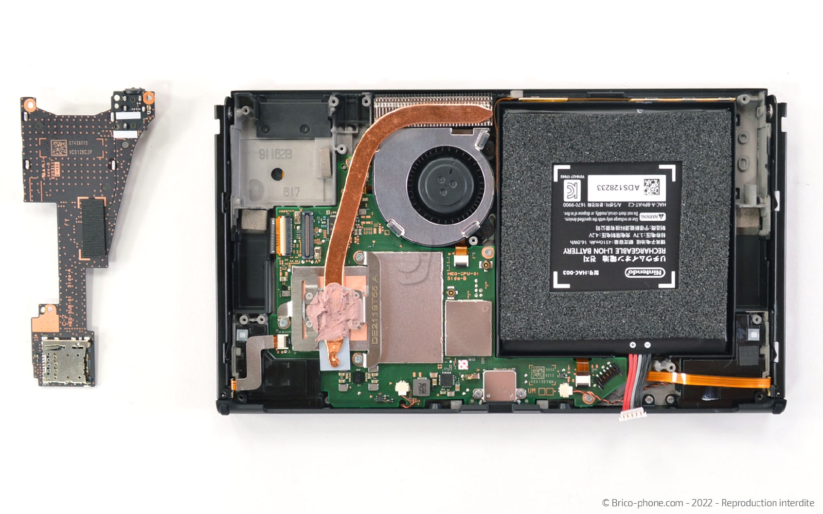 Comment changer le module du lecteur de cartouche sur Switch Oled photo 4